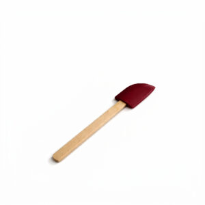 Silikonová stěrka 25,5 cm s dřevěnou rukojetí je vhodná na roztírání těsta, krémů i polev. Měkké hrany se dobře přizpůsobí povrchu nádoby.