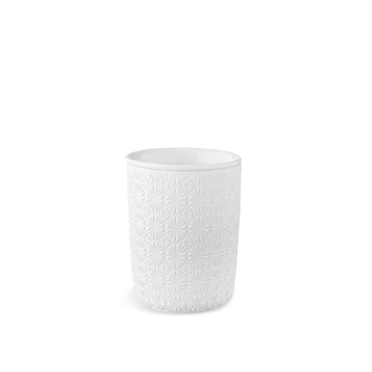 Bílá dvoustěnná porcelánová šálka s neglazovaným reliéfním povrchem a glazovaným vnitřkem.